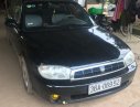 Kia Spectra 2003 - Cần bán lại xe Kia Spectra sản xuất 2003, màu đen còn mới, giá chỉ 120 triệu