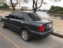 Ford Laser GHIA 1.8 MT 2003 - Cần bán xe Ford Laser GHIA 1.8 MT năm 2003, giá tốt