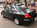 Kia Spectra LS 2004 - Bán Kia Spectra LS sản xuất 2004, màu đen xe gia đình, giá tốt