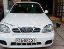 Daewoo Lanos SX 2005 - Cần bán Daewoo Lanos SX sản xuất 2005, màu trắng xe gia đình giá cạnh tranh