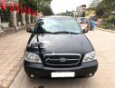 Kia Carnival GS 2.5 AT 2009 - Cần bán xe Kia Carnival GS 2.5 AT sản xuất năm 2009, màu đen chính chủ