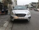 Kia Carens MT 2011 - Cần bán lại xe Kia Carens MT năm 2011, màu bạc xe gia đình