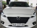Mazda 3  AT 2015 - Cần bán Mazda 3 AT 2015, màu trắng, odo 5 vạn chuẩn