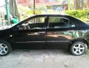 Toyota Corolla altis  MT 2003 - Cần bán lại xe Toyota Corolla Altis MT đời 2003, màu đen, xe nhà chạy rất kỹ