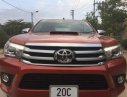 Toyota Hilux 2016 - Cần bán lại xe Toyota Hilux đời 2016, màu đỏ, giá chỉ 725 triệu