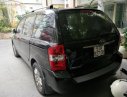 Kia Carnival EX 2.7 MT 2009 - Bán Kia Carnival 2.7 đời 2009, màu đen, nhập khẩu xe gia đình, 380tr