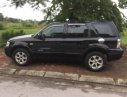 Ford Escape  AT 2004 - Cần bán Ford Escape AT 2004, màu đen, form mới, đèn ống, xe còn rất mới