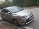 Toyota Vios E 2015 - Chính chủ bán xe Toyota Vios E sản xuất 2015, màu vàng cát