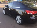 Kia Forte 2010 - Cần bán Kia Forte 2010, màu đen xe gia đình