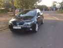 Kia Forte 2010 - Cần bán Kia Forte 2010, màu đen xe gia đình