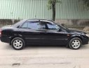 Mazda 323 2003 - Cần bán xe Mazda 323 năm sản xuất 2003, màu đen, 150tr