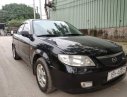 Mazda 323 2003 - Cần bán xe Mazda 323 năm sản xuất 2003, màu đen, 150tr