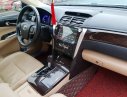 Toyota Camry 2.0E 2016 - Bán xe Camry 2.0E sản xuất năm 2016, số tự động, máy xăng, màu vàng cát, nội thất màu kem, đã đi 45000 km