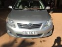 Toyota Corolla altis 2009 - Cần bán gấp Toyota Corolla Altis đời 2009, màu bạc xe gia đình