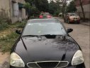 Daewoo Nubira 2002 - Bán Daewoo Nubira 2002, màu đen số sàn