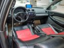 Mazda 323   2007 - Bán Mazda 323 năm sản xuất 2007, màu đen, xe nhập