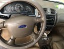 Ford Laser GHIA 1.8 AT 2004 - Bán xe Ford Laser GHIA 1.8 AT năm sản xuất 2004, màu xanh 