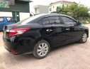 Toyota Vios 1.5E 2015 - Cần bán Toyota Vios 1.5E đời 2015, màu đen chính chủ