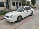 Daewoo Nubira 2002 - Cần bán Daewoo Nubira năm sản xuất 2002, màu trắng như mới