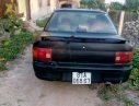 Mazda 323 1.6 MT 1995 - Bán Mazda 323 màu đen, đăng ký năm 1996, máy êm, gầm bệ chắc chắn, chạy lướt, giá rẻ