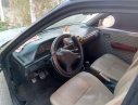 Mazda 323 1.6 MT 1995 - Bán Mazda 323 màu đen, đăng ký năm 1996, máy êm, gầm bệ chắc chắn, chạy lướt, giá rẻ