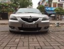 Mazda 3 1.6 2004 - Cần bán xe Mazda 3 1.6 năm 2004, màu bạc như mới, giá 255tr