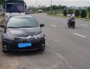 Toyota Corolla altis 1.8G AT 2017 - Cần bán lại xe Toyota Corolla altis 1.8G AT 2017, màu đen như mới 