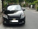 Chevrolet Aveo LTZ 2015 - Cần tiền bán gấp Chevrolet Aveo 2015 số tự động màu đen