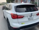 BMW X1   1.8 AT  2016 - Cần bán BMW X1 1.8 AT năm 2016, màu trắng