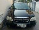 Kia Carnival   2009 - Bán Kia Carnival 2009, màu đen, nhập khẩu, số tự động 