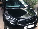 Kia Rondo 2.0 GAT 2014 - Cần bán Kia Rondo 2.0 GAT đời 2014, màu đen