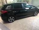 Kia Rondo 2.0 GAT 2014 - Cần bán Kia Rondo 2.0 GAT đời 2014, màu đen