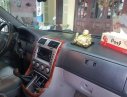 Kia Carnival   2007 - Cần bán Kia Carnival 2007, màu đen chính chủ, 235 triệu