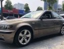 BMW 3 Series  325i  2005 - Cần bán BMW 3 Series 325i 2005, màu vàng, xe nhập