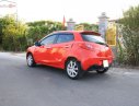 Mazda 2 S AT 2013 - Gia đình bán Mazda 2 S AT màu đỏ còn rất mới, đời 2013, bên ngoài chưa trầy xước