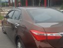 Toyota Corolla altis 1.8G MT 2015 - Bán Toyota Corolla altis 1.8G MT đời 2015, màu nâu, đẹp như mới