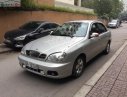 Daewoo Lanos SX 2004 - Cần bán gấp Daewoo Lanos SX 2004, màu bạc