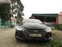 Hyundai Elantra 1.6 MT 2017 - Gia đình bán xe Hyundai Elantra 1.6 MT đời 2017, màu đen số sàn