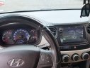 Hyundai Grand i10   1.2 MT 2018 - Bán ô tô Hyundai Grand i10 1.2 MT sản xuất 2018, màu trắng, mua tháng 4/2018