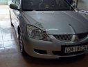 Mitsubishi Lancer 2004 - Cần bán lại xe Mitsubishi Lancer 2004, màu bạc số tự động, giá tốt