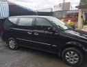 Kia Carnival 2006 - Bán Kia Carnival đời 2006, màu đen, nhập khẩu xe gia đình, giá tốt