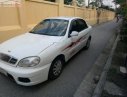 Daewoo Lanos SX 2004 - Gia đình cần bán Daewoo Lanos SX đời 2004, màu trắng, giá 72tr