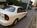 Daewoo Lanos SX 2004 - Gia đình cần bán Daewoo Lanos SX đời 2004, màu trắng, giá 72tr