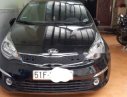 Kia Rio AT 2015 - Cần bán xe Kia Rio AT sản xuất 2015, màu đen