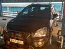 Kia Carens SXMT 2012 - Bán Kia Carens SXMT đời 2012, màu đen, đã đi 65000 km