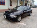 Mazda 323 GLXi 1.6 MT 2000 - Bán Mazda 323 2000, còn tương đối nguyên bản