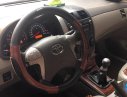 Toyota Corolla altis 1.8G MT 2009 - Bán xe Toyota Corolla Altis 1.8G sx 2009, số tay, máy xăng, màu đen, nội thất màu kem, đã đi 154000 km