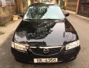 Mazda 626 2.0 MT 2003 - Bán Mazda 626 bản đủ nhất sx 2003, số tay, máy xăng, màu đen, hai túi khí phanh ABS