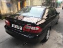 Mazda 626 2.0 MT 2003 - Bán Mazda 626 bản đủ nhất sx 2003, số tay, máy xăng, màu đen, hai túi khí phanh ABS