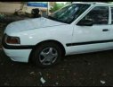 Mazda 323  MT 1996 - Cần bán xe Mazda 323 MT 1996, màu trắng, máy ngon, nội thất đẹp, trợ lực kính điện